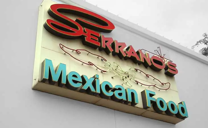Exterior sign reading Serrano's Mexican Food