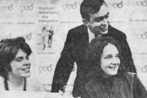 A newspaper photo of American Management Services founder George Cloutier and two young employees in the 1960s.